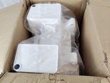 a cardboard box with a couple of items inside of it