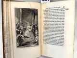 un livre ouvert sur lequel figure le dessin d'un homme tenant une épée