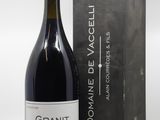 la bouteille de vin se trouve à côté d'une boîte de vin