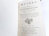an open book that is sitting on a table