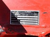 an image of a red tractor with a label on it