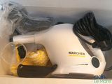 a picture of a box with a vacuum and other items