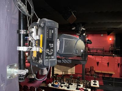 an image of a movie projector set up in a theater