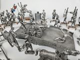 a lot of figurines that are sitting on a table