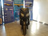a motorcycle that is parked in a showroom