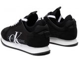 black sneakers with white logo and black soles