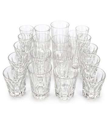 a lot of glasses that are sitting on a table