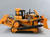 a toy bulldozer that is sitting on a table
