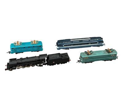 four different types of toy trains on a white background