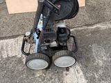 an image of a small pressurer on the sidewalk