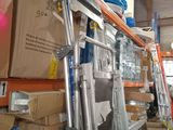 a ladder that is leaning against a wall in a warehouse