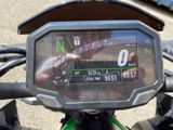 a close up of a motorcycle with a speedometer on it ' s dashboard