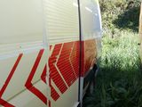 a van that is parked on the side of the road
