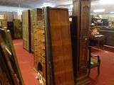 many pieces of furniture that are on display in the room