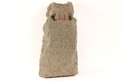 an image of a stone statue of a woman holding a baby