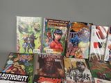 a lot of comic books sitting on a table
