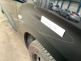 a car that has a sticker on the side of it