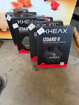 three boxes of khexa izoard ii on a table