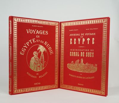 two red book covers with gold trimming and gold trimming on them