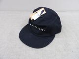 a close up of a black hat with a tag on it
