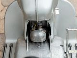 a close up view of a motor scooter with a gas tank