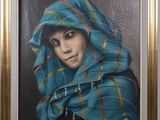 painting of a woman with a blue scarf on her head in a gold frame