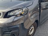 an image of a van that has been badly damaged