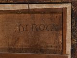 a close up of a piece of wood with writing on it