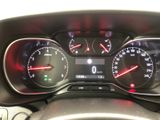 a close up of a car dashboard with various gauges