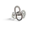 a close up of a ring on a white background