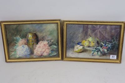 two framed paintings of fruit and flowers on a table