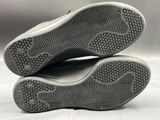 the soles of a pair of shoes are shown on a white surface