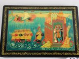 an image of a picture of a box with a painting on it