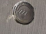 a close up of a metal object with a hole in it