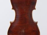 an old violin with a wooden back and a long neck