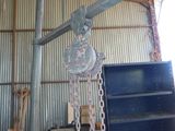 a picture of a crane hanging from the ceiling of a building