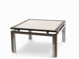 an image of a coffee table with a glass top and metal legs