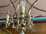 a chandelier hanging from the ceiling in a room