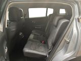 the back seats of a car with a seat belt in the back of it