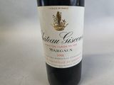 a bottle of wine that is sitting on a table