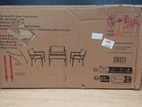 a cardboard box with a picture of a table and chairs on it