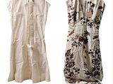 deux robes suspendues à un cintre sur fond blanc
