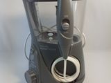 a blender that is sitting on a white surface