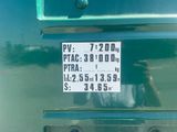 a sticker on the back of a green bus