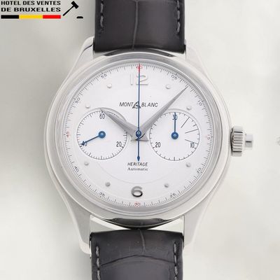 une image montrant un gros plan d'une montre-bracelet au cadran blanc