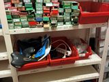 a shelf with many different items on it in a store