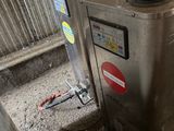 a machine that is sitting inside of a building