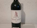 a bottle of wine that is on a table