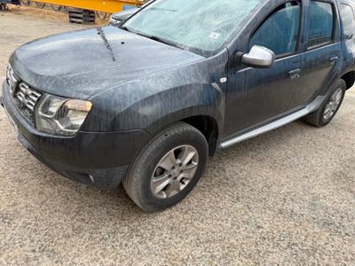 a picture of a dirty pick up truck parked in a lot