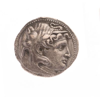 l'image d'une pièce d'argent sur laquelle figure le visage d'une femme
